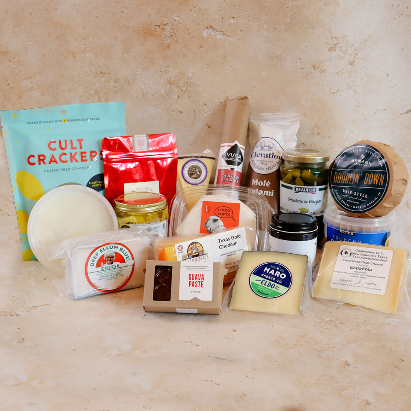 Photo shows 7 Texas cheese and assorted goodies for Texas Food Gifts