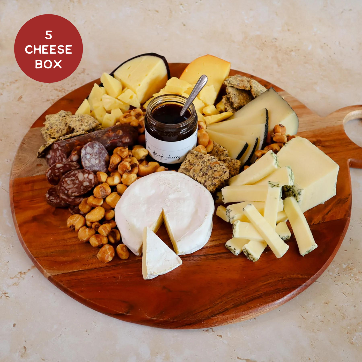 Image includes 5 Texas Cheeses cut with pairings plated for the holiday