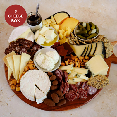 Image includes 9 Texas Cheeses cut with pairings plated for the holiday