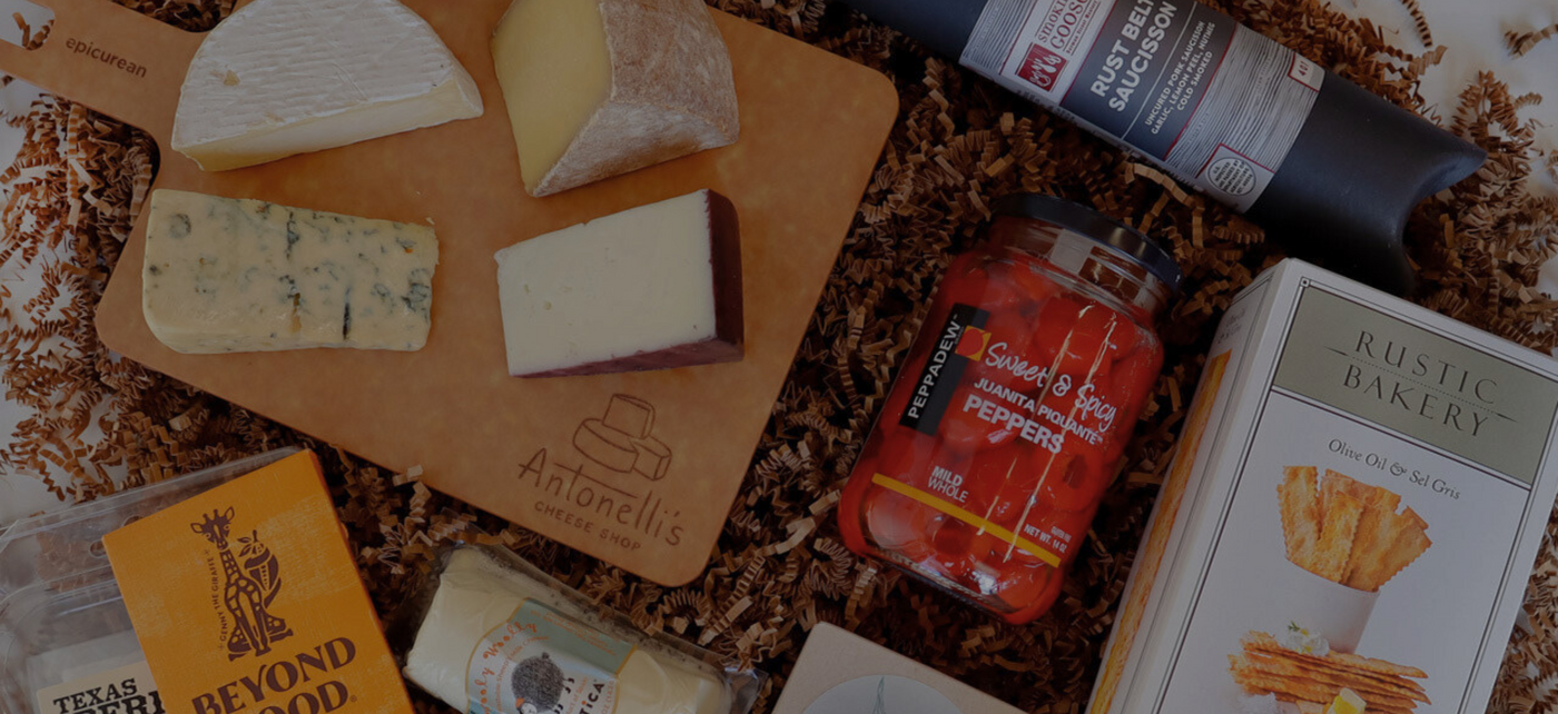 A selection of cheeses, sundries and pairings from our monthly cheese club