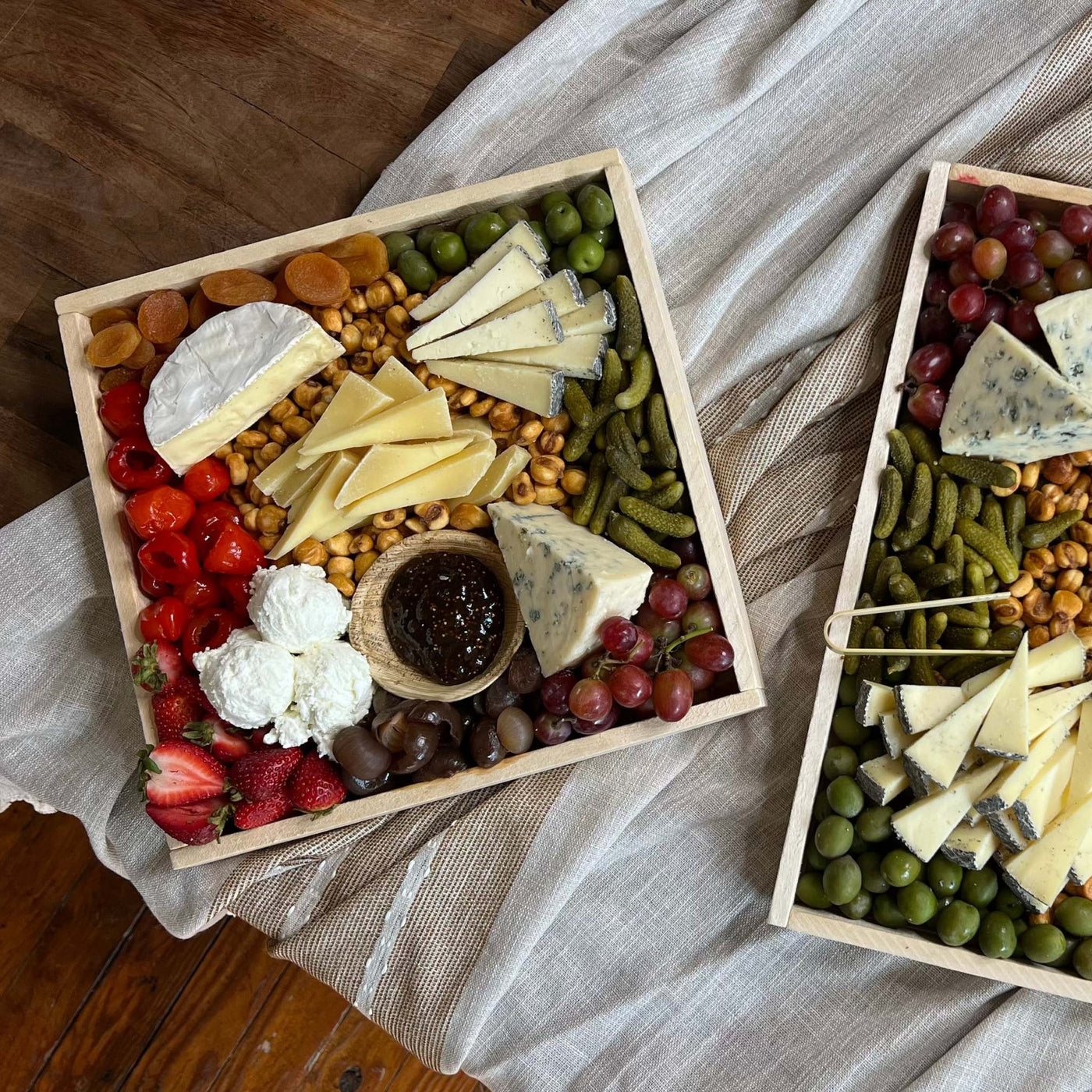 side by side images of large and small vegetarian cheese board