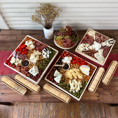 Top view of Large Grazing Table with multiple platters and crackers