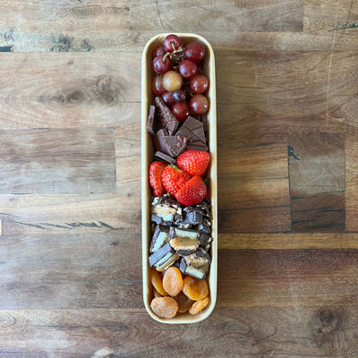 dessert tray with chocolate and fruit