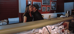 John and Kendall Antonelli behind the counter of Antonelli's Cheese