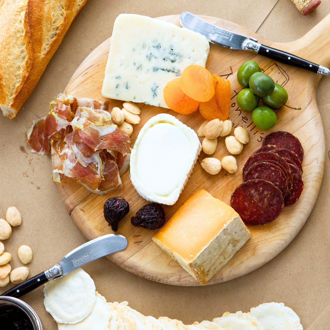 Cheese tray and pairings on a table