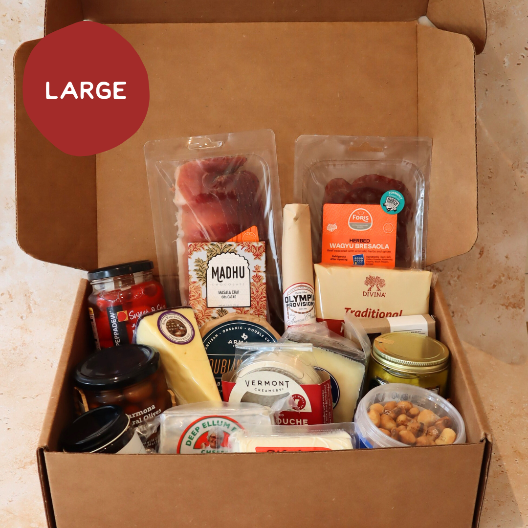 Thanksgiving cheese board in a box large with multiple cheeses and pairings