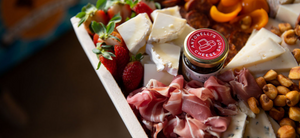 An antonelli's cheese and charcuterie tray